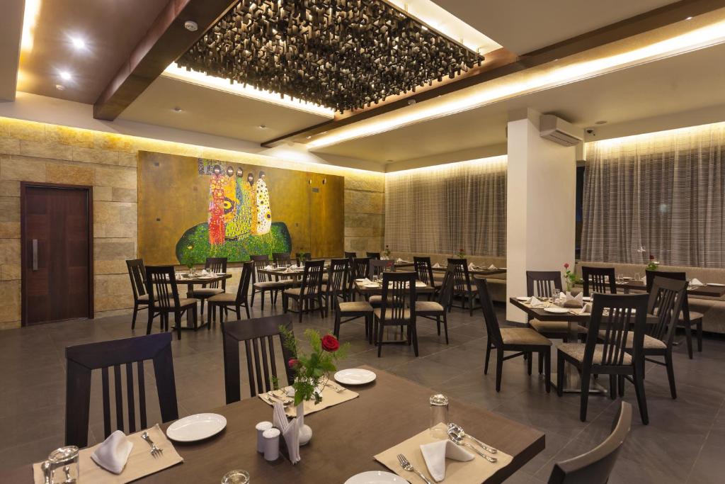 Chaitali Pure Veg Restaurant dining room with set tables