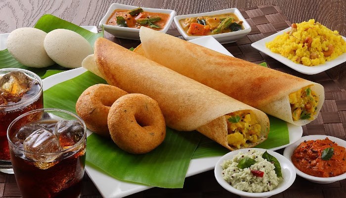 South Indian vegetarian breakfast with dosa, idli and chutney